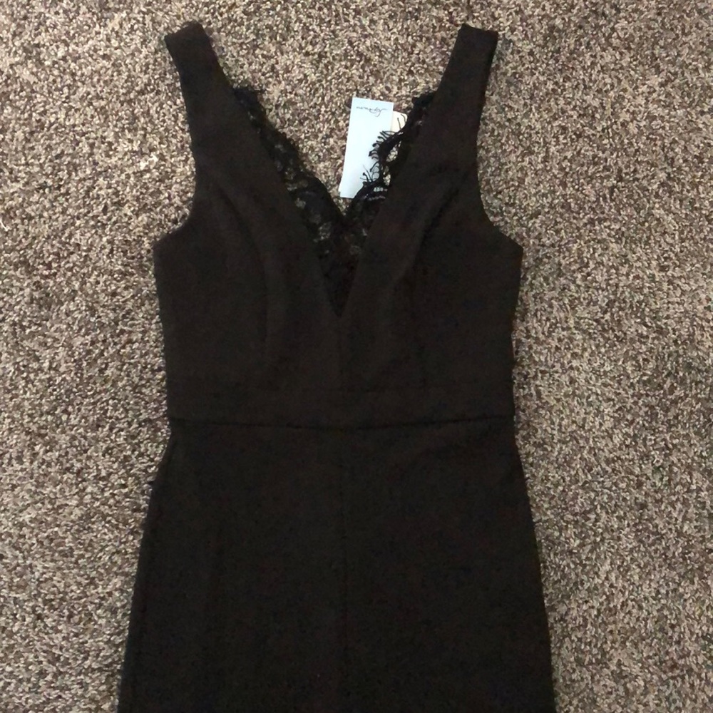 Black v-neck jumpsuit.